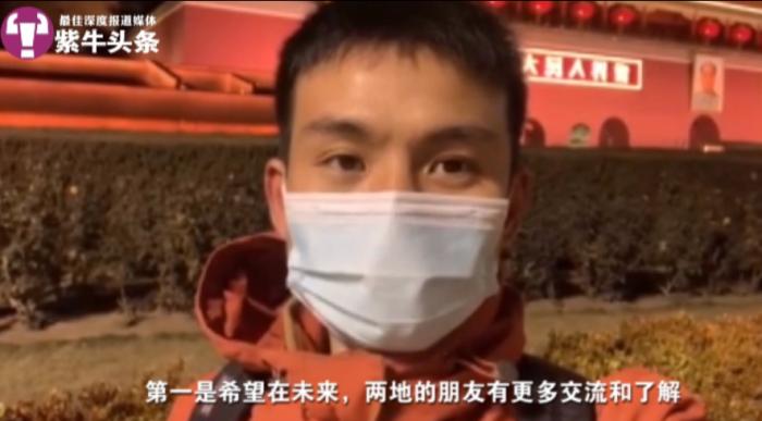 39天骑行2910公里 香港小伙新年第一天到天安门看升旗