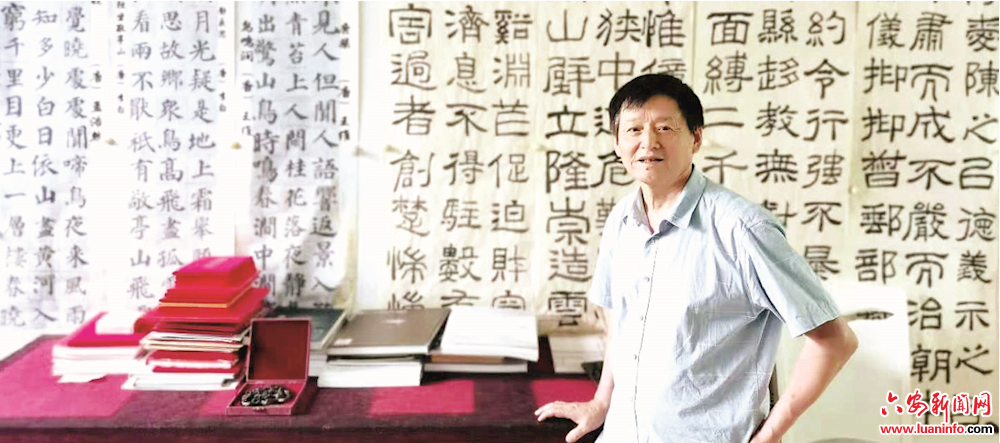 李胜：丹青不渝绘老区 